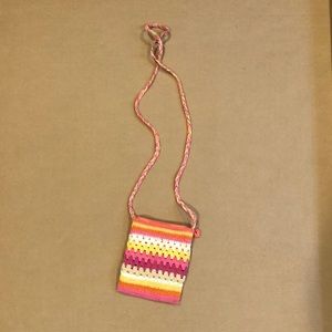 Pink, beige, yellow, and white crotchet purse